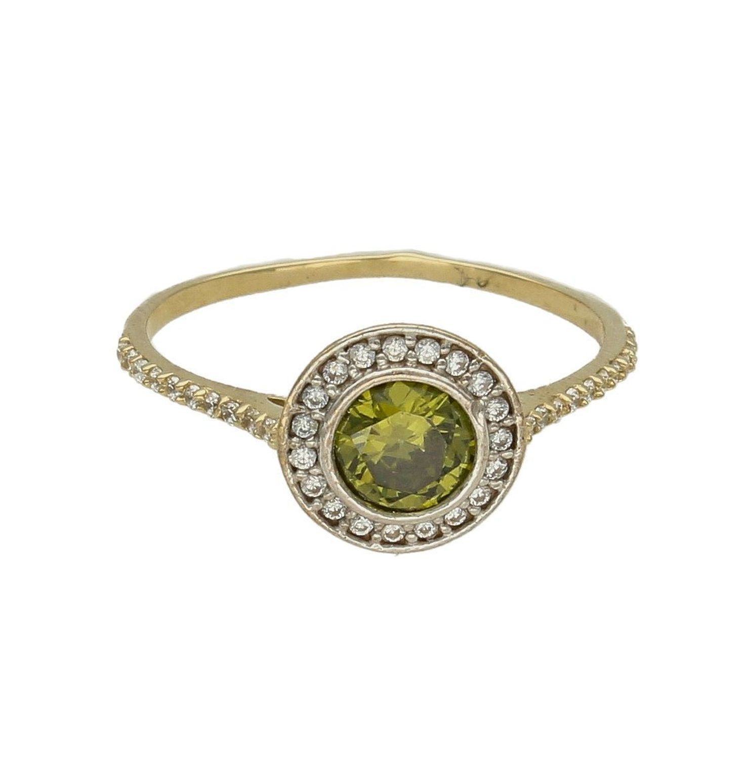 Złoty pierścionek 585 z oliwinem i cyrkoniami PI 3548G. Pierścionek został wykonany z najwyższej jakości złota próby 333. Waga pierścionka wynosi około 1,52 gram. Pierścionek został ozdobiony kamieniami naturalnymi o modnym .jpg